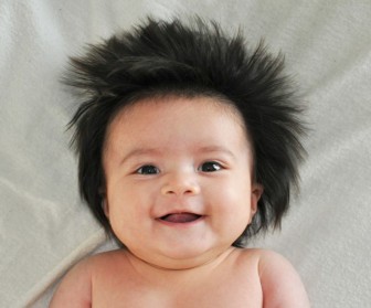 Pictures of children born with a head full of hair.