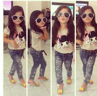 Little kids are dressed like adults.